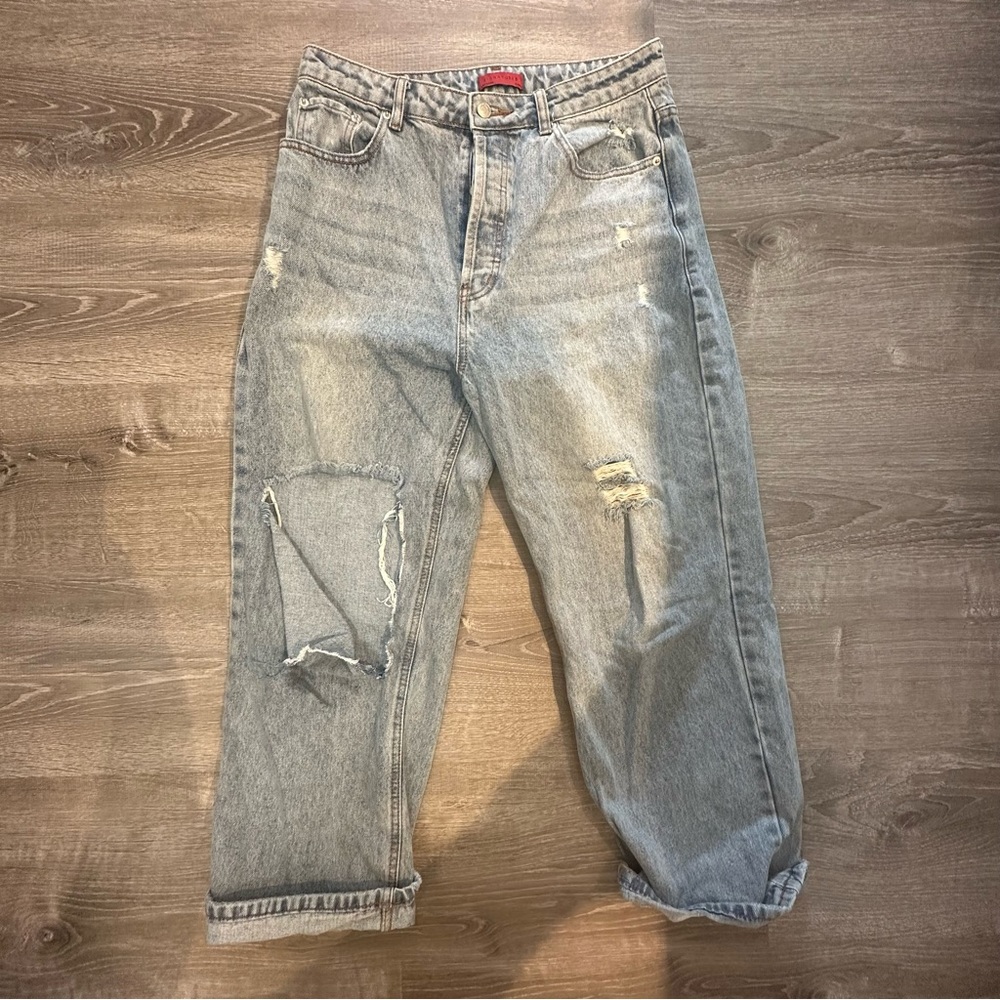 Ripped oversized blue jeans